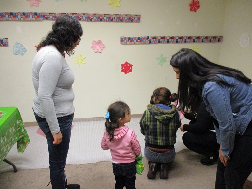 Families in the popcorn room at the christmas party